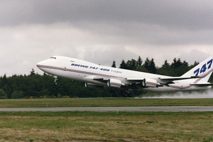 The transport version of Boeing 747, as shown above, after modifications, was envisioned to carry up to 10 Model 985 microfighters inside a dorsal hangar structure.